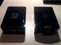 Raspberry pi model B and B2 side by side.